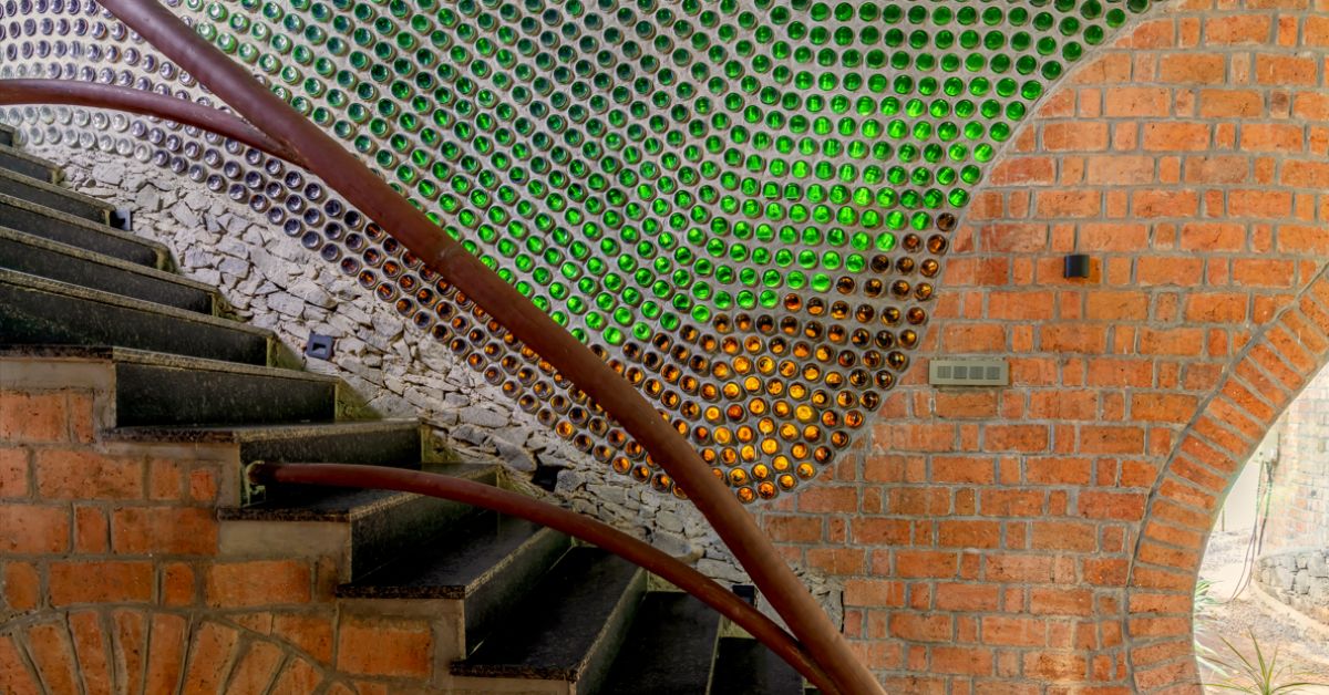 The recycled glass wall glows up when the light hits it during the sunset. 