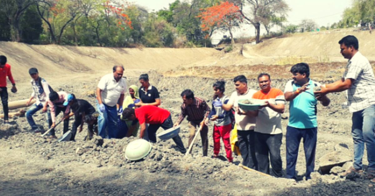 Volunteers help IAS officer restore historical pond