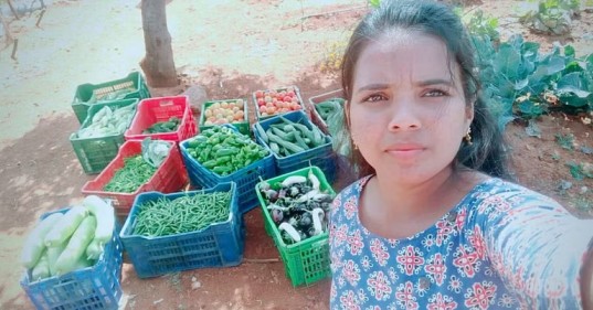 Roja Reddy with her organic produce. 